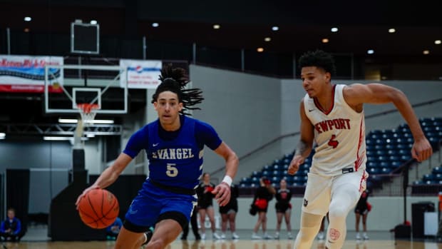 Kyran Tilley, left, threw down a highlight-reel alley-oop dunk last week for Evangel Christian (Kentucky).